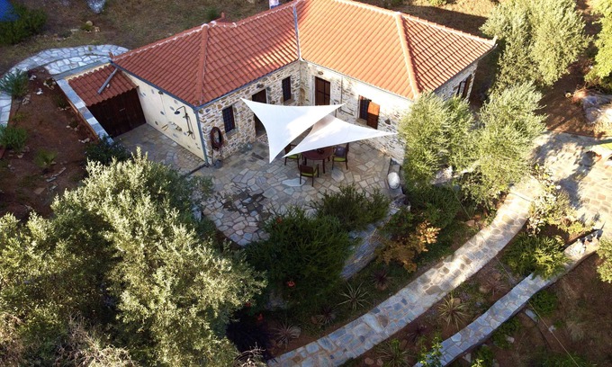 Kali Vrysi House | Kalivi Elena, a traditional, restored stone house in Platanias, Pelion.