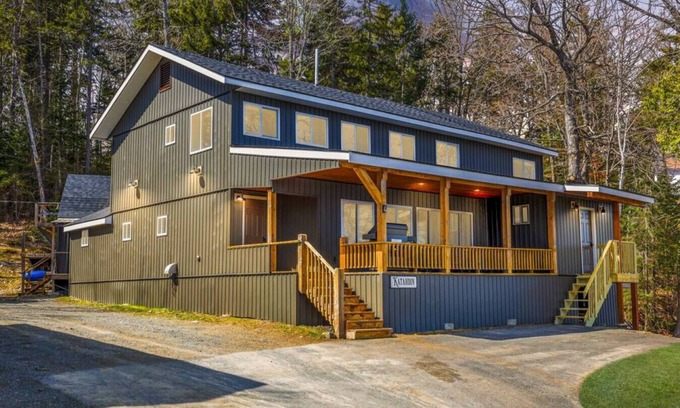Northeast Somerset Cabin | Katahdin - Cabin 4 · Lawrence's Lakeside Cabins | 'Katahdin': Boat Dock + Kayaks