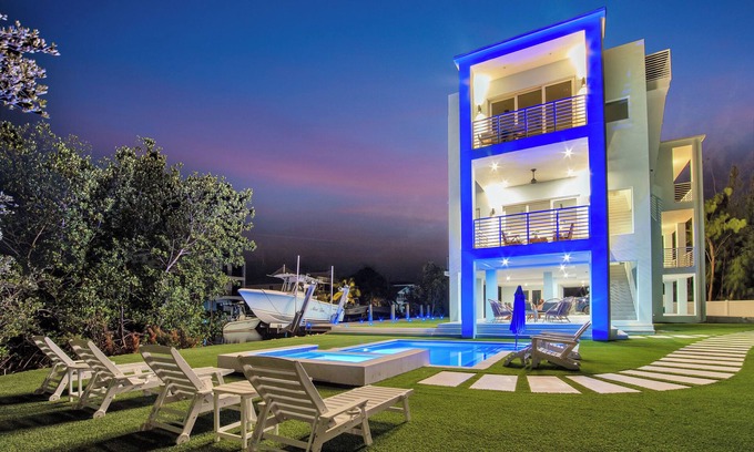Key Largo House | Keys Casa: Elegant Waterfront Retreat, Sleeps 16, Elevator, Private Dock, Putt-Putt