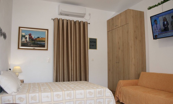 Atalanti Apartment | KOLLITAKI - apartment on the beach road. Couple or family of three friendly