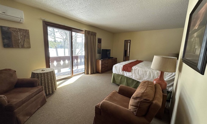 Eagle River Condo | Lake Forest Resort – Relax on a Pristine Sandy Beach in the Northwoods!