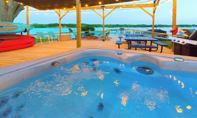 Lake Odessa Cabin | Lakefront Cottage In Town; Walk to Restaurants; Hot Tub