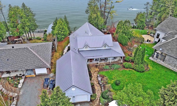 Brock House | Lakefront Cottage w/Hot Tub, BBQ Grill, Patio, Fire Pit, Dock, Sauna, Fire Place