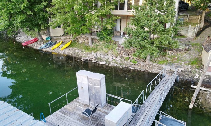 Lost Bridge Village House | Lakefront home right on the water, private cove on Beaver Lake, Garfield, AR