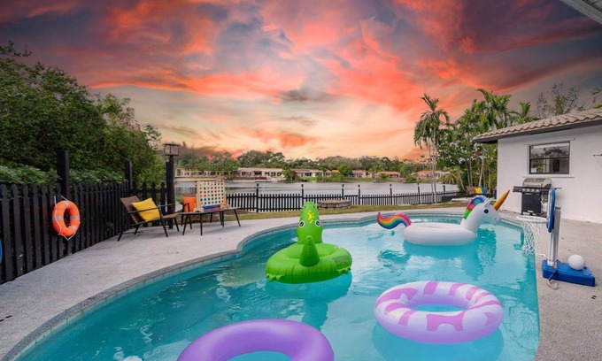 Ojus House | Lakefront Retreat Perfect for Family Fun With Heated Pool, King Bedroom, Lake Vi