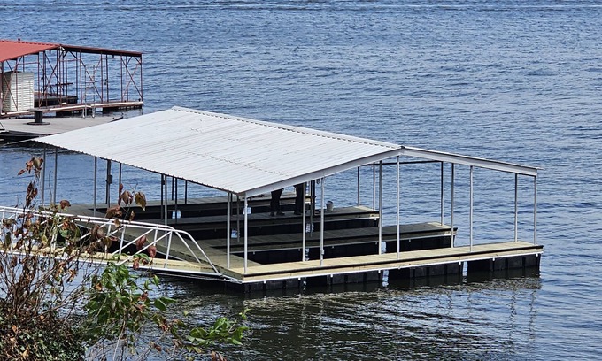 Tia Juana Cabin | Lakeside, boat dock and hot tub with this snug small cabin.