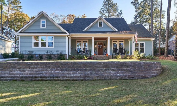 Whispering Pines House | Lakeside Serenity: Pines & Tranquility. nYour home for the 2024 US Open