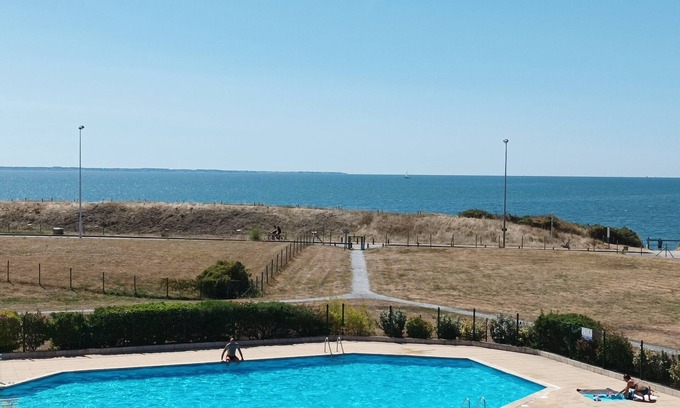 Morbihan Apartment | Large 2-bedroom apartment with sea and pool views. Beach 40 meters away.