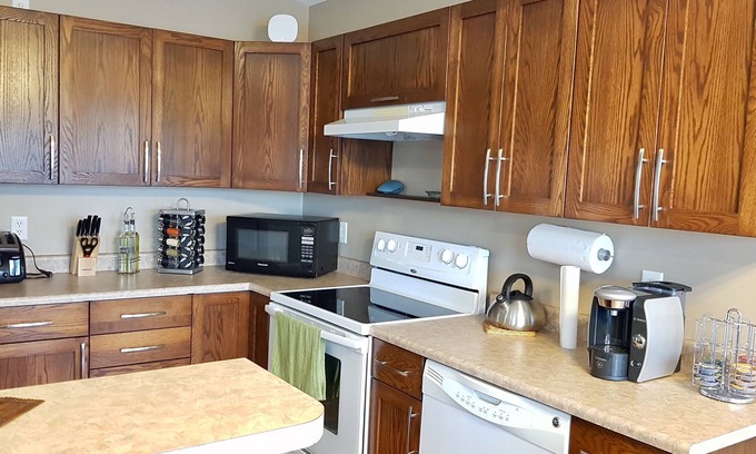 Grande Prairie House | Large group welcome house, 4 beds & fenced backyard