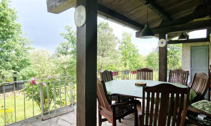 Brignac-la-Plaine House | Large house with covered terrace in the countryside, panoramic view