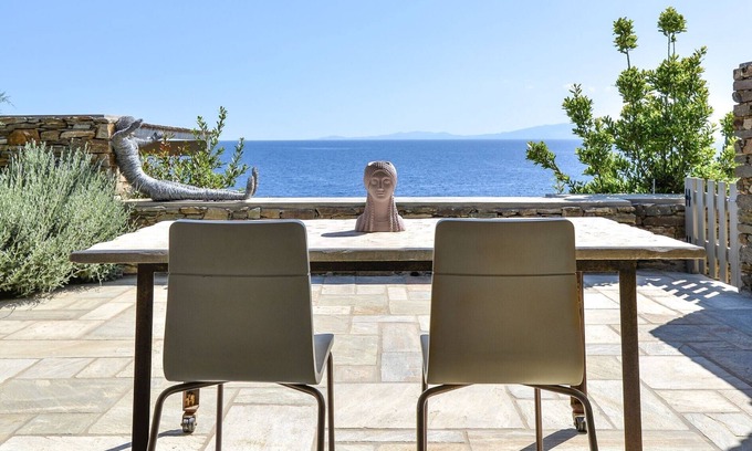 Agios Romanos Villa | Lavish Tinos See Front Villa | Villa Areti | 2 Bedrooms | Breathtaking Sea Views | Private Furnished Terrace with Shaded Outdoor Dining Area | Pet Friendly | Shared Outdoor Pool | Prime Location | Agios Romanos