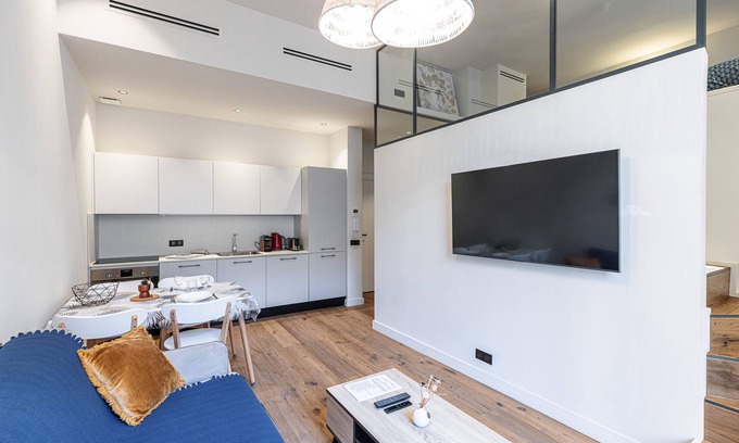 Musicians Quarter Apartment | Le Victor Hugo, air conditioning, elevator, balcony