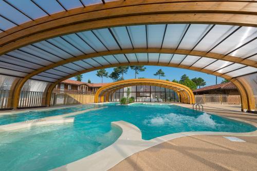 Parentis-en-Born Resort | Les Cottages Du Lac