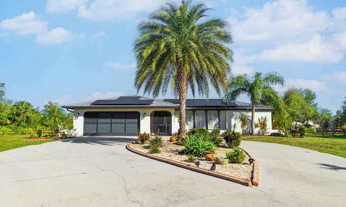 Punta Gorda House | Living on mansion, 3br home in Punta Gorda with heated pool, 2 acres with pond