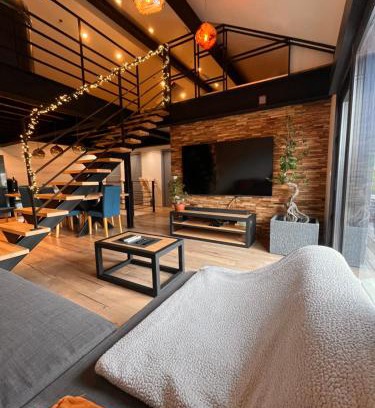 Sainte-Marie-dʼAlloix Apartment | Loft industriel avec jacuzzi