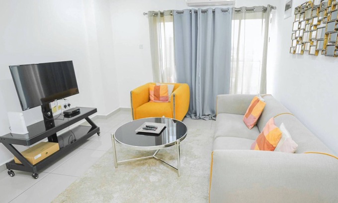 East Legon Apartment | Lovely 1BDR Near Mall and Airport with Rooftop Pool and Gym