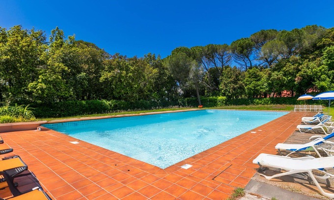 Rosignano Marittimo Apartment | Lovely apartment for 7 guests with pool, WIFI, TV and patio