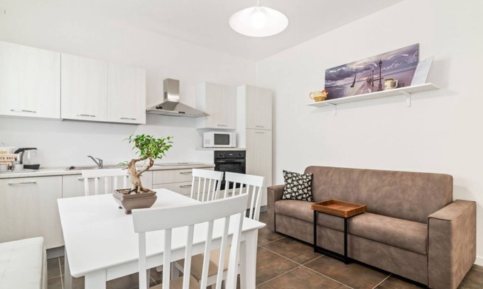 Abano Terme Apartment | Lovely apartment for 4 people in a completely renovated building, located in a quiet residential area a stone's throw from the historic center of Abano Terme. The flat is 5 minutes away by foot from San Lorenzo Cathedral, 10 minutes away from Piazza Merc