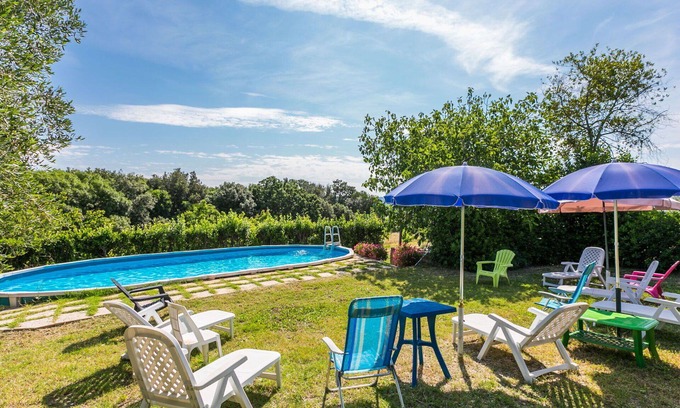 Follonica Villa | Lovely apartment in villa for 12 guests with WIFI, private pool, TV, patio and pets allowed
