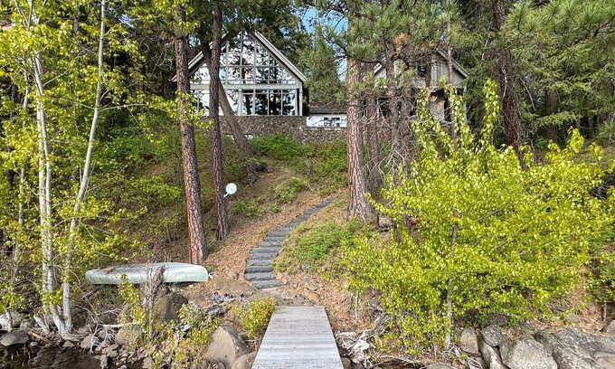 Hayden Lake House | Luxe, lakefront home with dock, amazing lake views, patio & fireplace