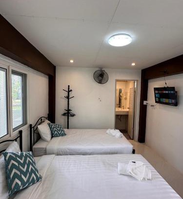 K. Phu Pieng Bed & Breakfast | Luxe Nan Twin Bed Room