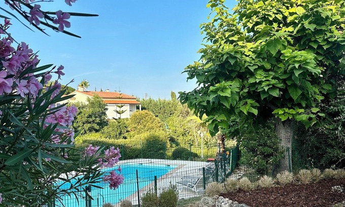 Mandelieu-La-Napoule Apartment | Luxury apartment in quiet location, large terrace, garden, swimming pool.