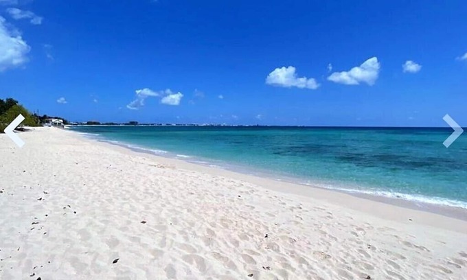 West Bay Villa | Luxury Beach Villa few steps from Seven Mile Beach + Outdoor bed swing