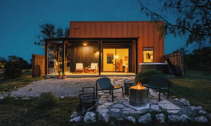 Stonewall Cabin | Luxury cabin in the center of the Texas Wine Country; large private porch w/hot tub, gas grill and fire pit; pet friendly