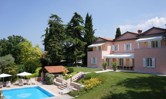 Montioni Villa | Luxury & Chic Rental Villa Lake Garda Lazise. Lake view and swimming pool
