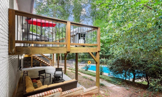 Dunwoody House | Luxury City Retreat: Heated Pool & Game Room in an Urban Nature Escape. Atlanta
