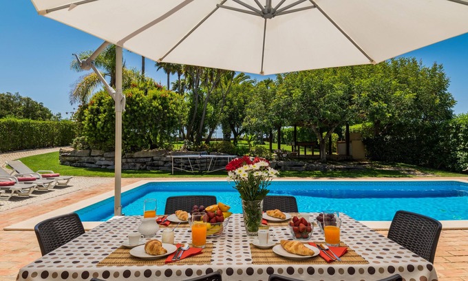 Almancil Villa | Luxury Family Villa with private heated pool, putting-green and tennis court