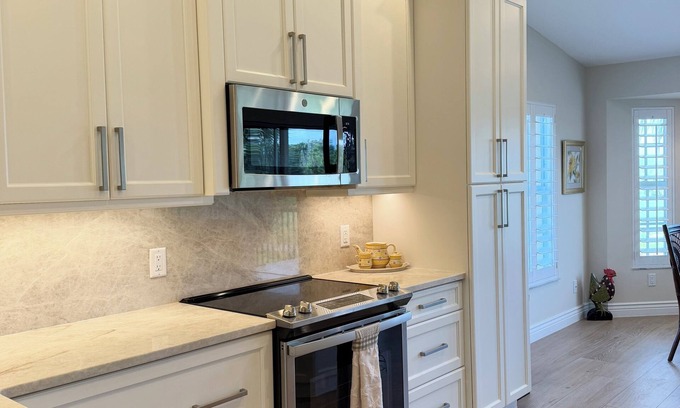 Grandezza Condo | Luxury finishes in this 2+ bedroom condo with WiFi and AC in Sunny Estero