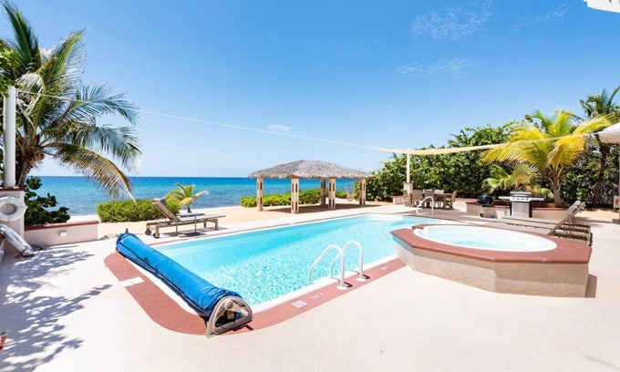 Stake Bay House | Luxury Oceanfront Villa, 2 Primary Suites + 3rd bdrm, Pool