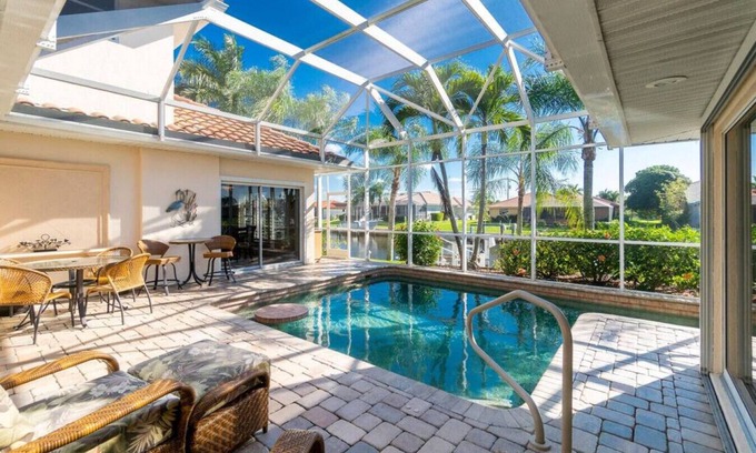 Punta Gorda House | Luxury Punta Gorda Villa | Heated Pool Dock Bikes Kayaks