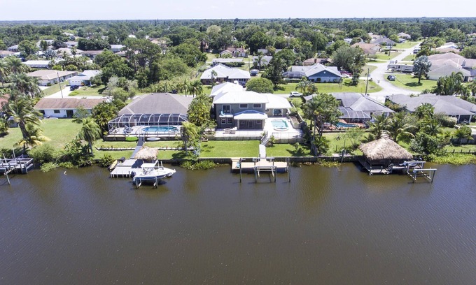 Port Saint Lucie House | Luxury Riverfront Home Pool Dock 20 Min To beach 15 Min to Mets Stadium Pets OK