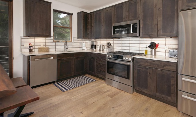 Silverthorne Condo | Luxury Riverside Condo 5 minutes off I70. Two king beds, well equipped kitchen.