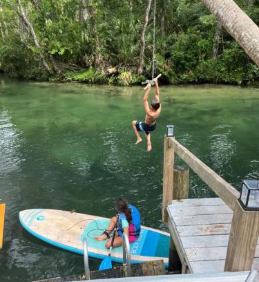 Weeki Wachee Gardens Villa | Main River Retreat hot tub, canoe with trolling motor