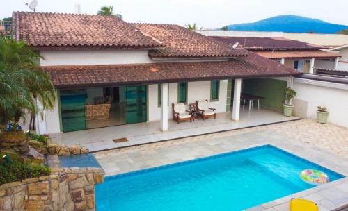 Jardim Virginia House | MAISON PARTY GUARUJÁ, PRAIA PISCINA SINUCA CHURRASQUEIRA HIDROMASSAGEM