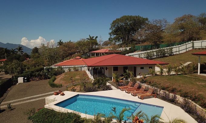 Escobal House | Mango Sunrise Retreat Modern 3-Bedroom House AC Mountain Views Saltwater Pool
