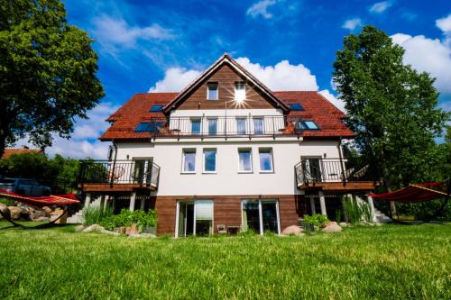 Ogonki Apartment | Mazurskie Apartamenty "Jak Tu Miło!"