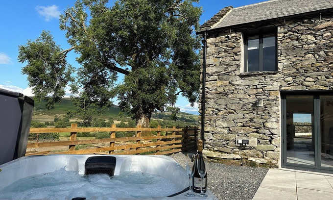 Penrith House | MEADOW SYKE BYRE, pet friendly, with hot tub in Bampton, Cumbria