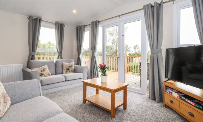 Carnforth Cottage | MEADOWSWEET LODGE, pet friendly, with a garden in Arkholme