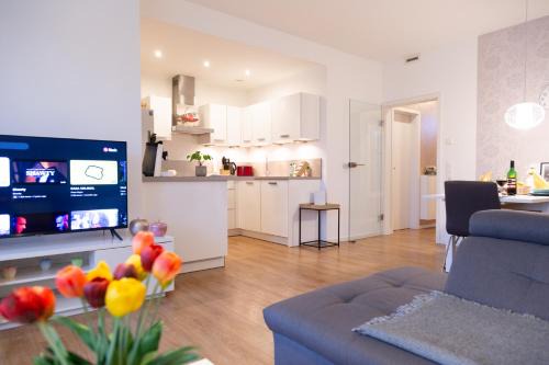 Oldenburg Apartment | MiCasa OL - Deluxe Apartment mit Stil - Carport Stellplatz - Küche - WLAN - 3,7 KW Steckdose für E Auto - Terrasse