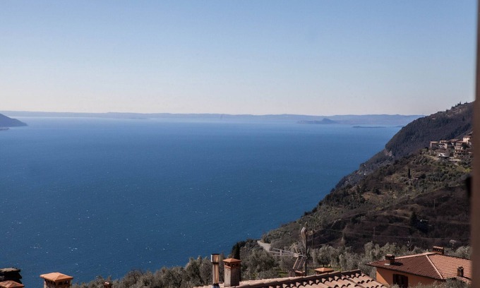 Oldesio Apartment | Mimosa - Theater Home, with marvellous lake view