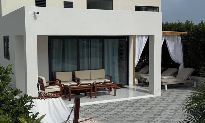 Lagun House | Modern 2-Bedr Oceanfront Villa with Hot Tub & Lounge Patio