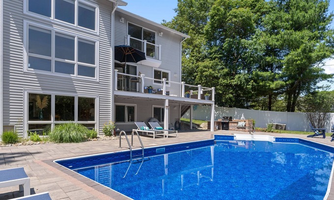 Haversham House | Modern coastal retreat w/pool, close to beaches and golf courses.