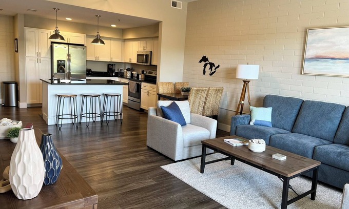 Manistee Condo | Modern condo on Manistee River just steps away from downtown!