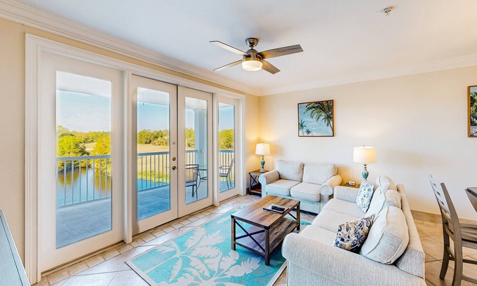 Carrabelle Condo | Modern condo with balcony, W/D, AC, pickleball, & swimming pool