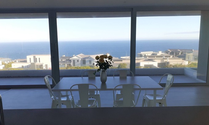 Pinnacle Point House | Modern, cozy house located in award winning golf estate with wood-fired hot tubs