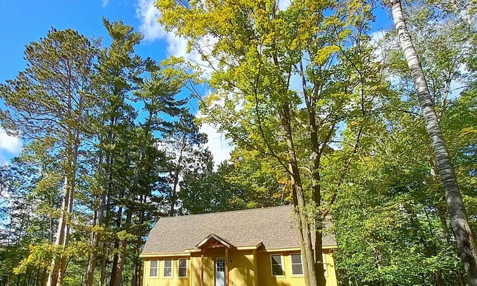 Longville Cabin | Modern Cozy Woman Lake Woodland Cabin, 24 acres, lakeshore, woodstove, AC, Wi-fi